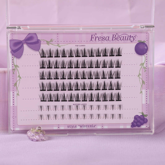 Fresa Beauty false eyelashes packaging with purple accents on a pink background