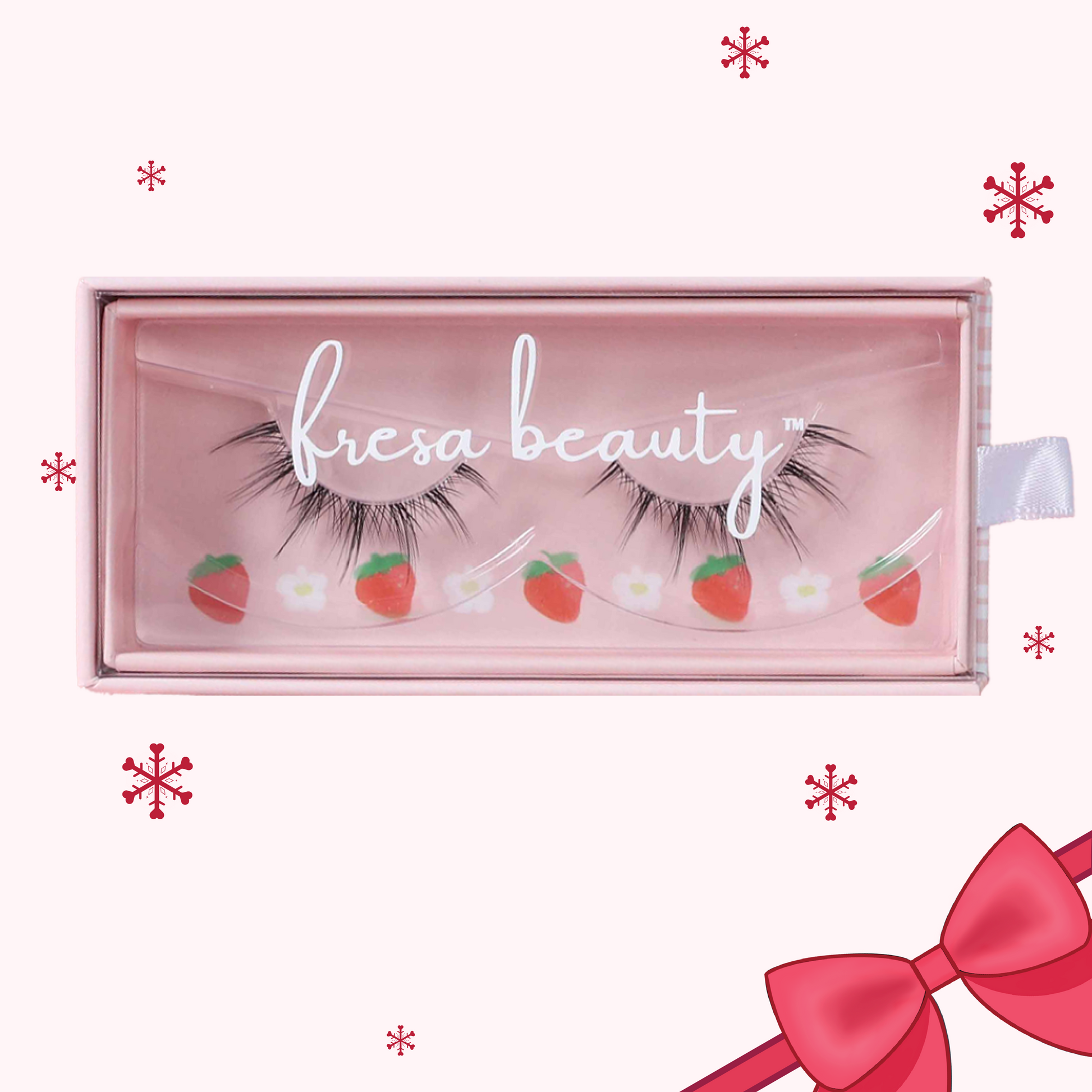 Fresa Beauty false eyelashes in a pink box with decorative elements on a white background