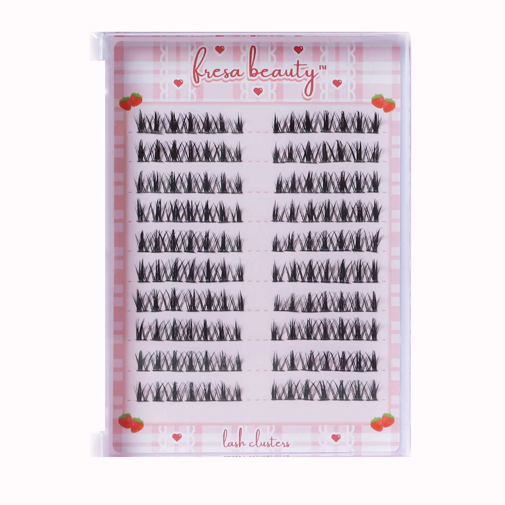 Fresa Beauty lash clusters packaging with gingham background and heart designs.
